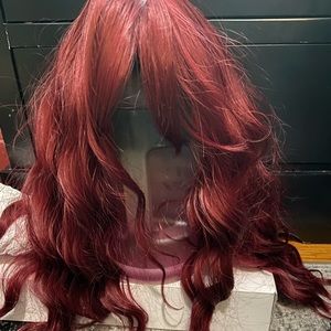 High quality synthetic wig w curls and waves and it’s not heavy at all.